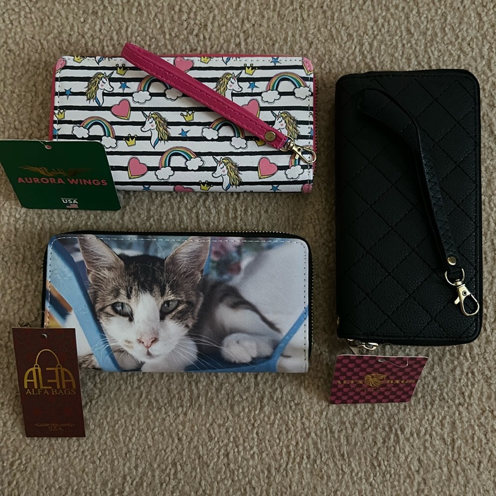 Brand New 2 Women’s Alfa Wallet’s And 1 Women’s Aurora Wings Wallet.